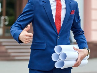 Cheerful professional architect showing thumbs up