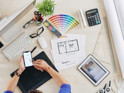 Interior designer checking smartphone