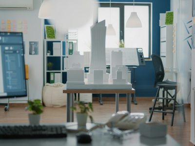 Nobody in office with 3d architecture design and building model for urban project